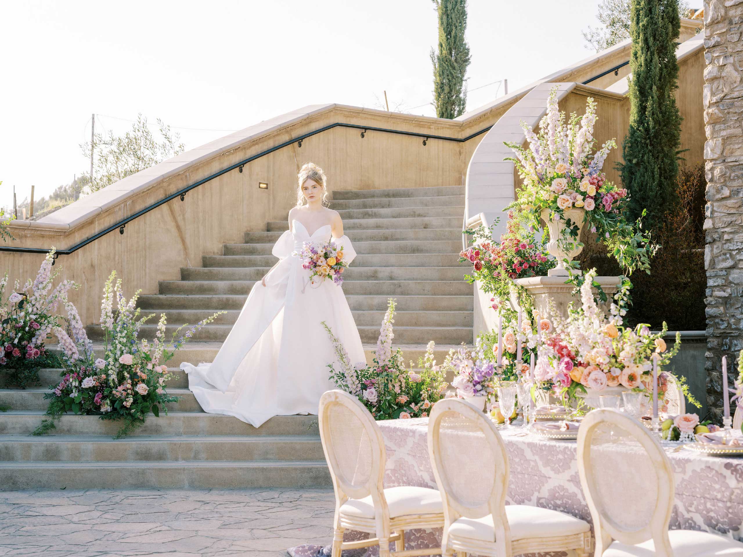 a bride descending the stairs